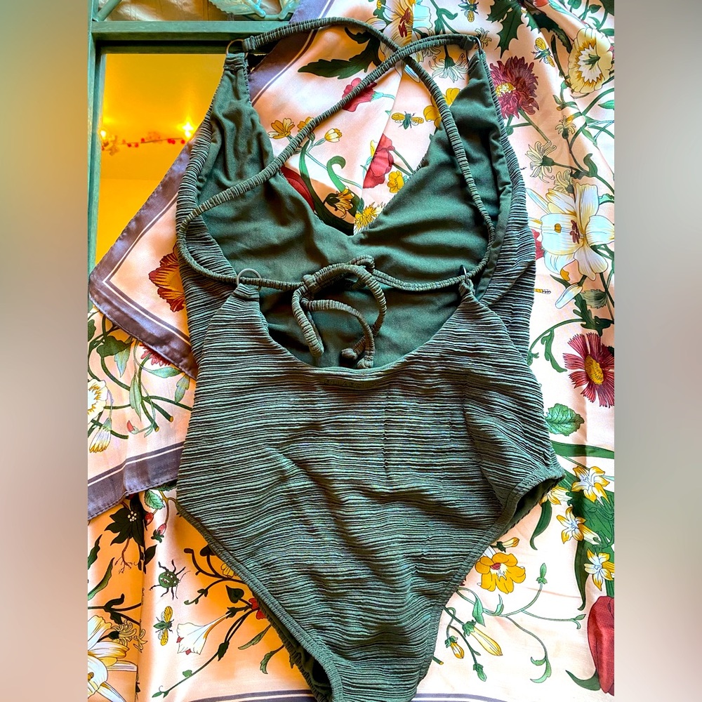 Green textured one piece swim suit